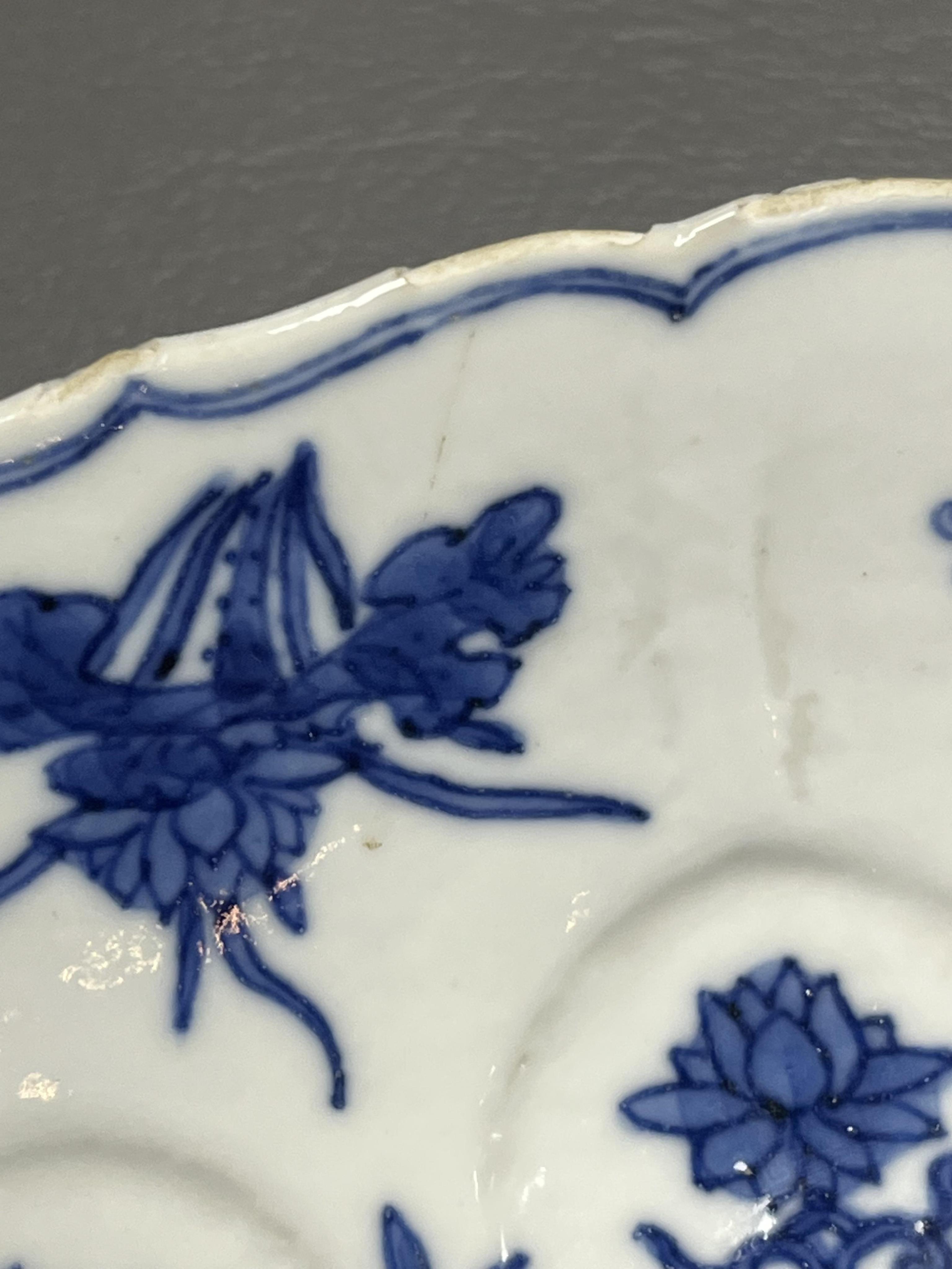 A Chinese blue and white ‘ladies and phoenix’ dish, Kangxi period